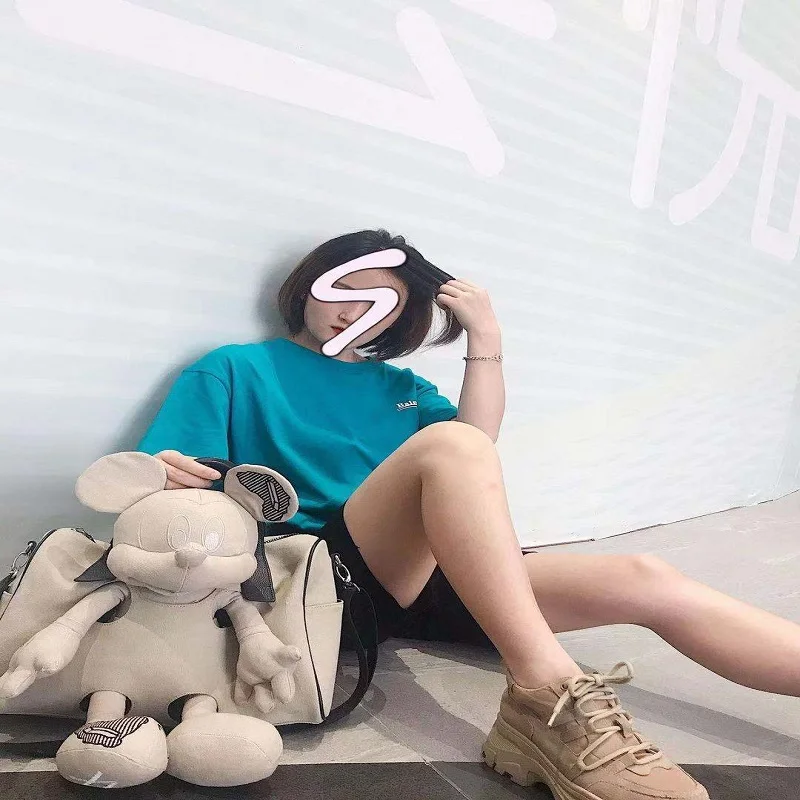 

Disney Mickey Mouse doll canvas portable messenger bag male and female students general large-capacity military travel bag