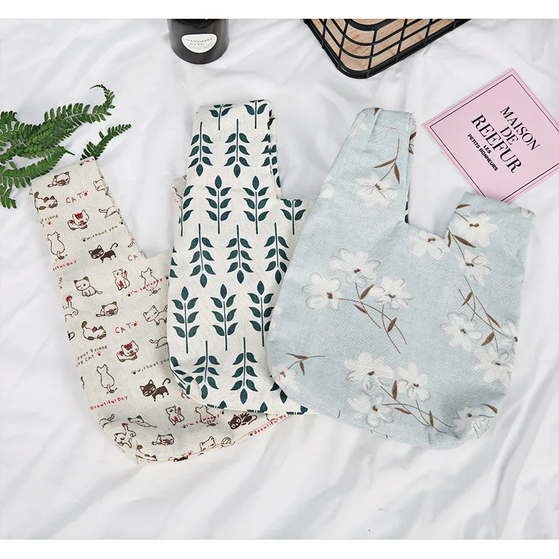 

Fashion Canvas Knot Wrist Bag Summer Floral Wrist Bag Walking Pack Mobile Phone Key Change Simple Carry-on Bag Shoulder Bags