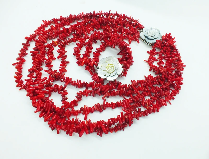 

Classic red coral necklace.Hand catenary
