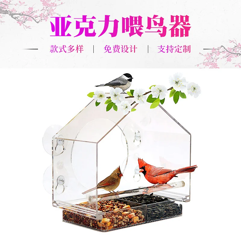 

A transparent feeder feeding bird container to feed the birds water fountain