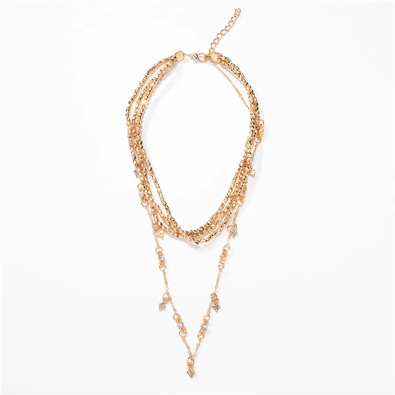 Женское многослойное колье чокер золотистого цвета с подвеской в виде звезды из