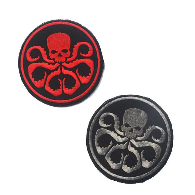 Значок девять змеиных родов Отдел отпуска и логотип агента подписанный двойной