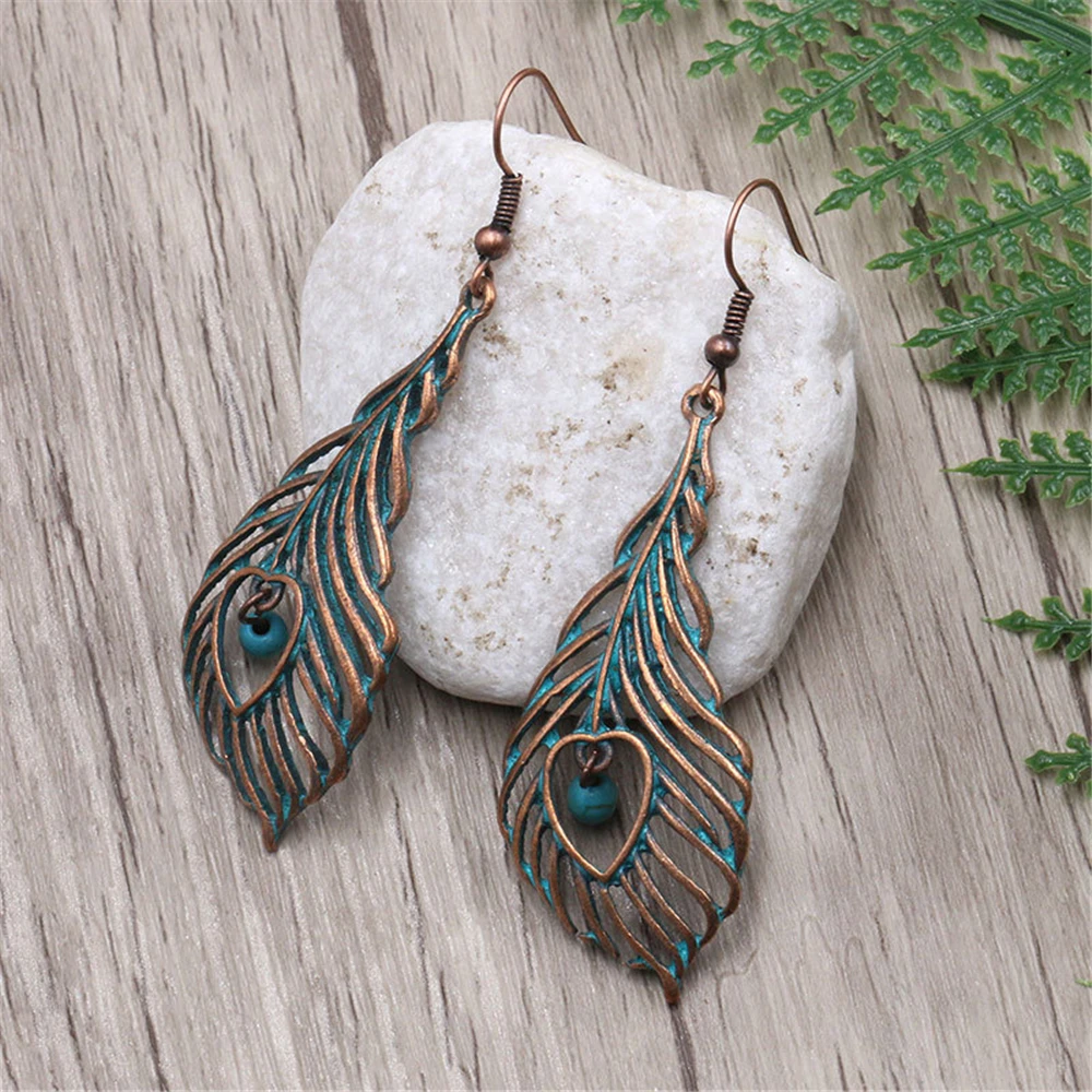 

Loredana Fashionable Delicate Metal Hollow - Out Leaves Phoenix Tail Hair Styling Earrings For Women.Jewelry Wholesale.EZ190
