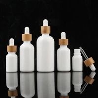 10ml 15ml 30ml white essential oil dropper bottle cosmetic glass pipette packaging container with wood grain bamboo lid cap