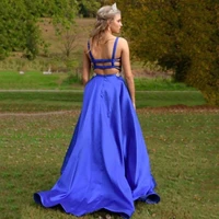 uzn elegant open back a line blue satin long homecoming dress hot sale straps prom dress beading party dress with pockets