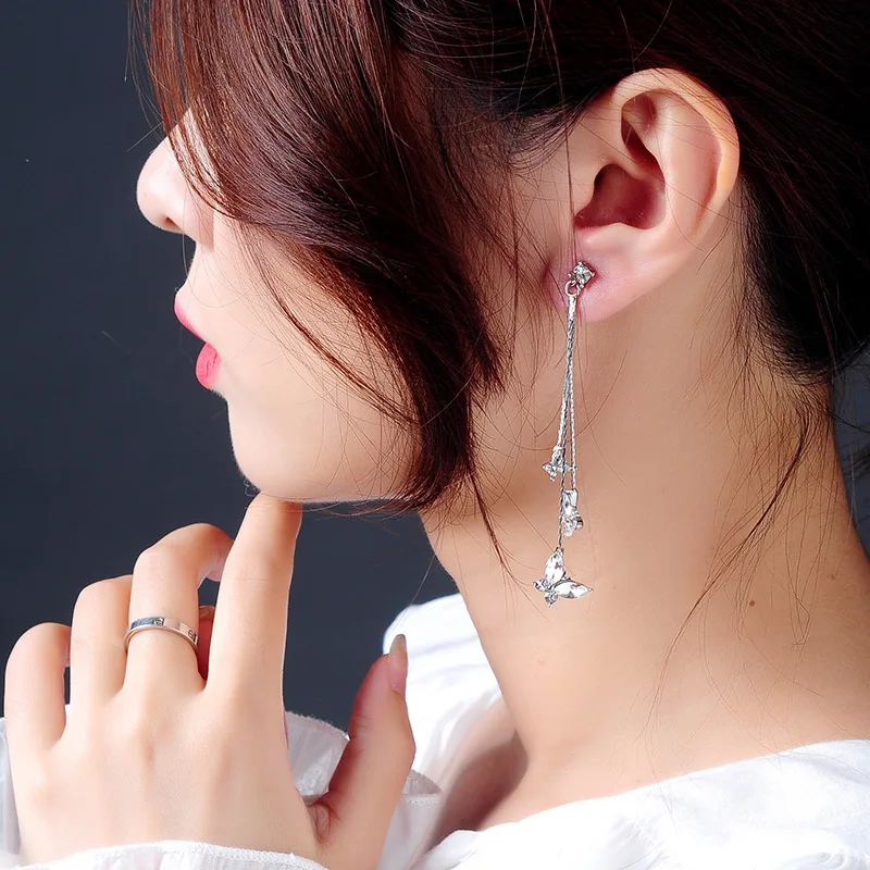 Korean version of the cold wind butterfly earrings fashion niche flowers long paragraph super fairy temperament earring | Украшения и