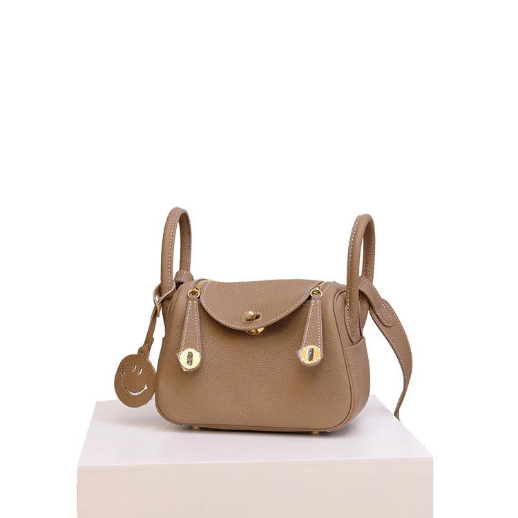 

Station bag Lindi bag 2021 new Togo cowhide women's bag portable shoulder bag doctor's bag