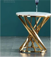 luxury light stainless steel gilt brushed designer tea table circle a few edges a few gold iron web celebrity minimalist marble