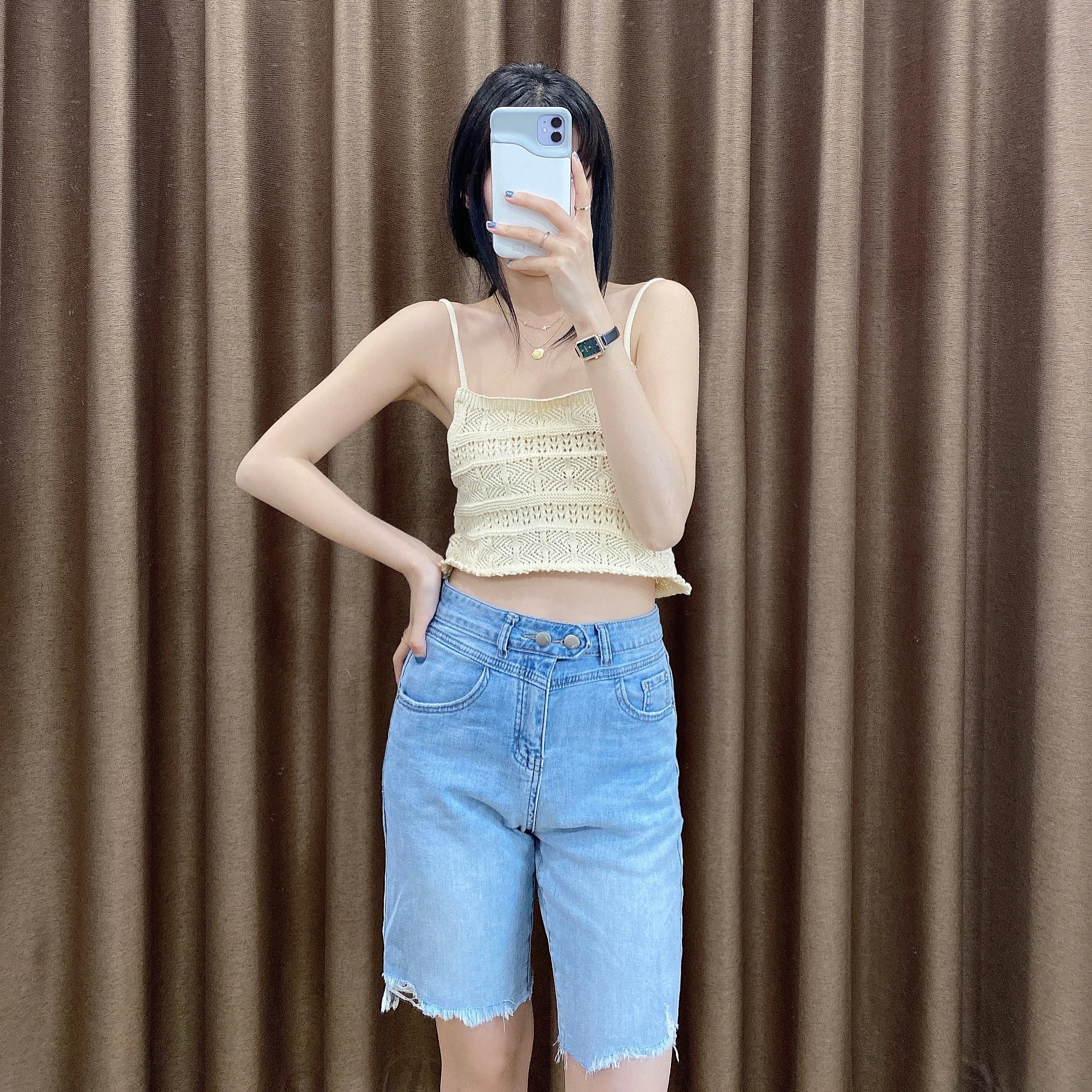 

Short hollow knit top with halter vest