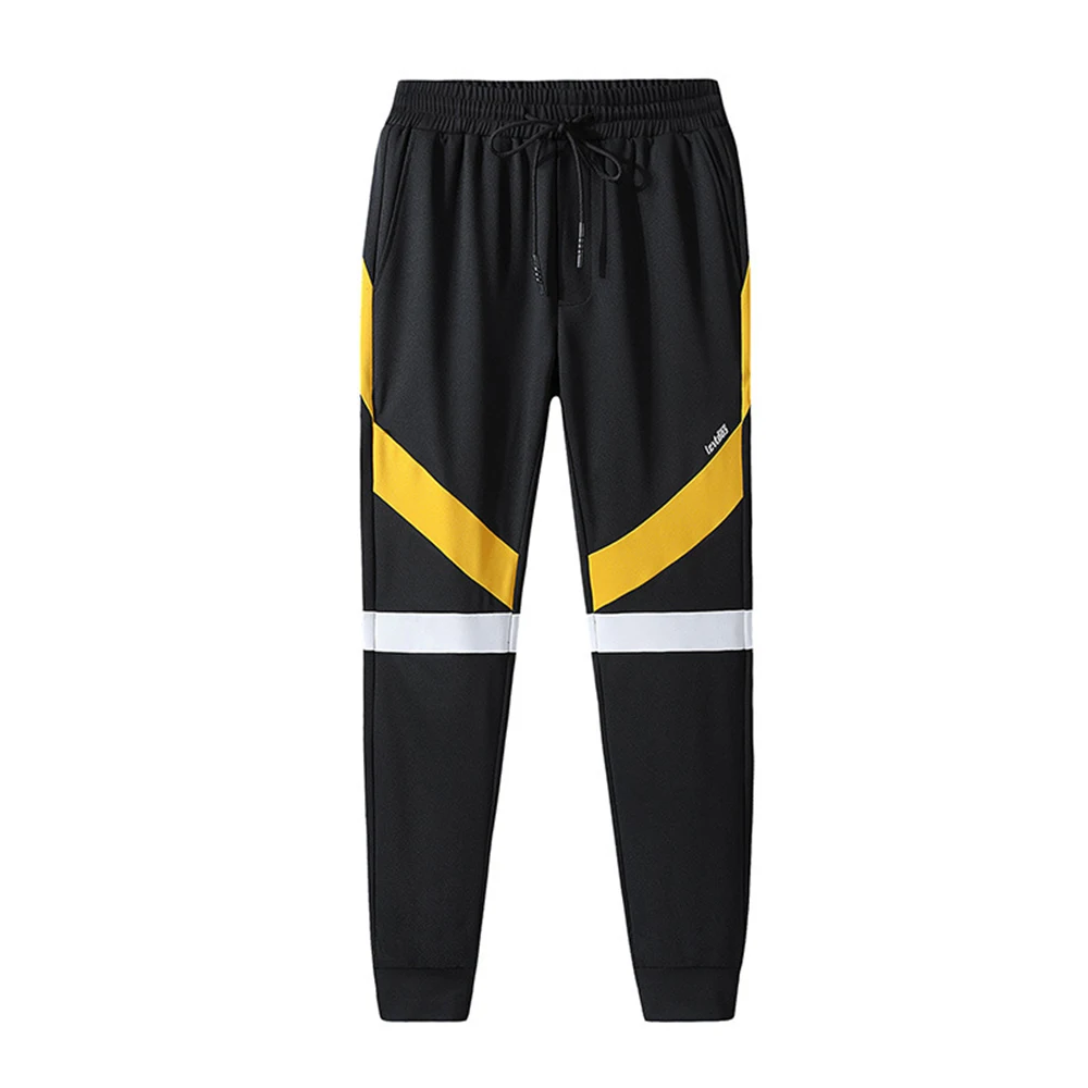 

Man jogging in the street sports leisure sportswear hip-hop fashion three color sports pants men casual pants pants beam footl