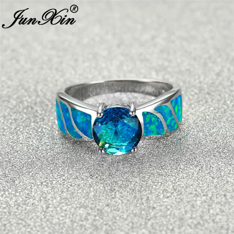 Женское кольцо с голубым огненным опалом обручальное градиентом радуги