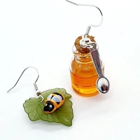 bee honey jar earrings asymmetrical earrings