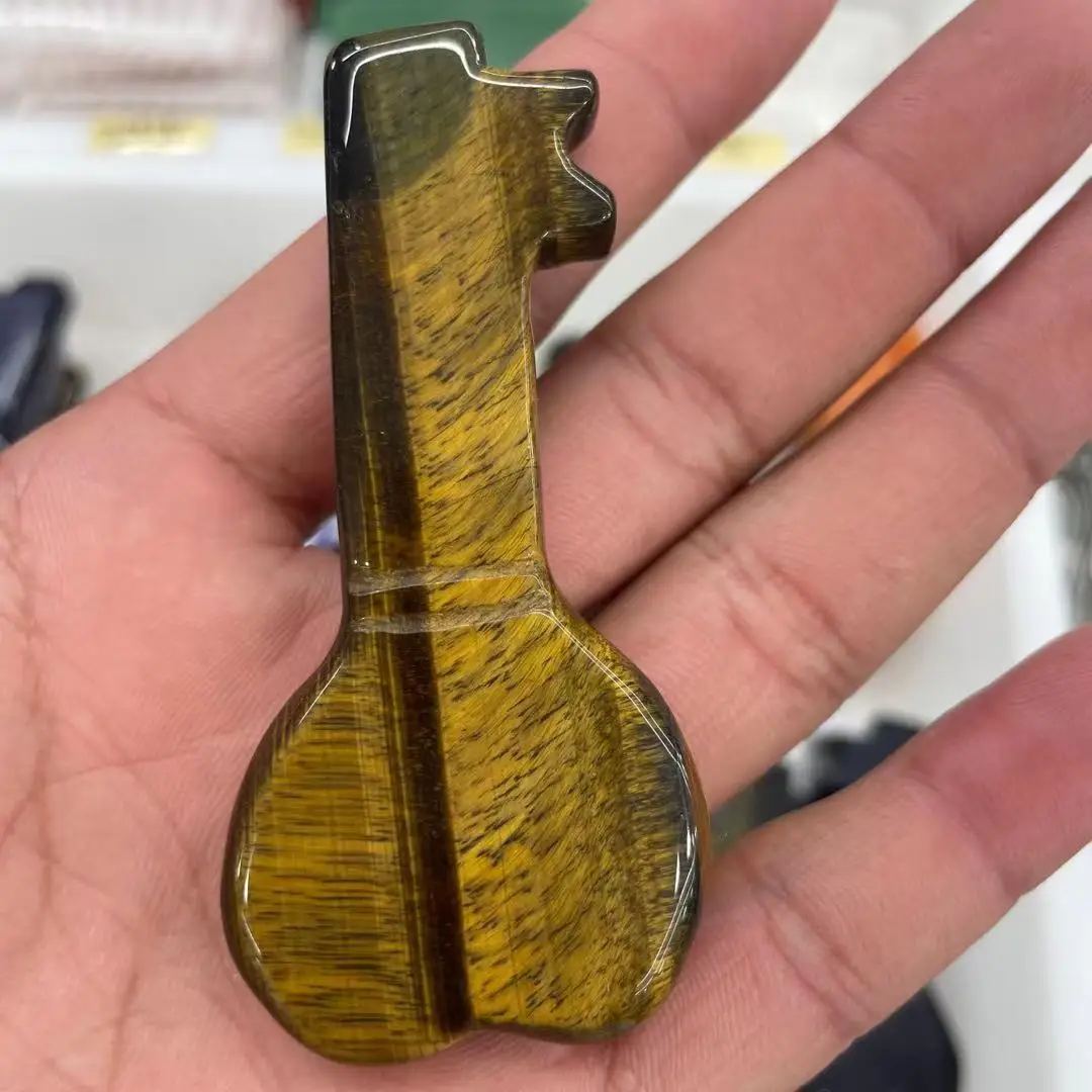 

Natural crystal tiger eye stone carving life key key healing reiki