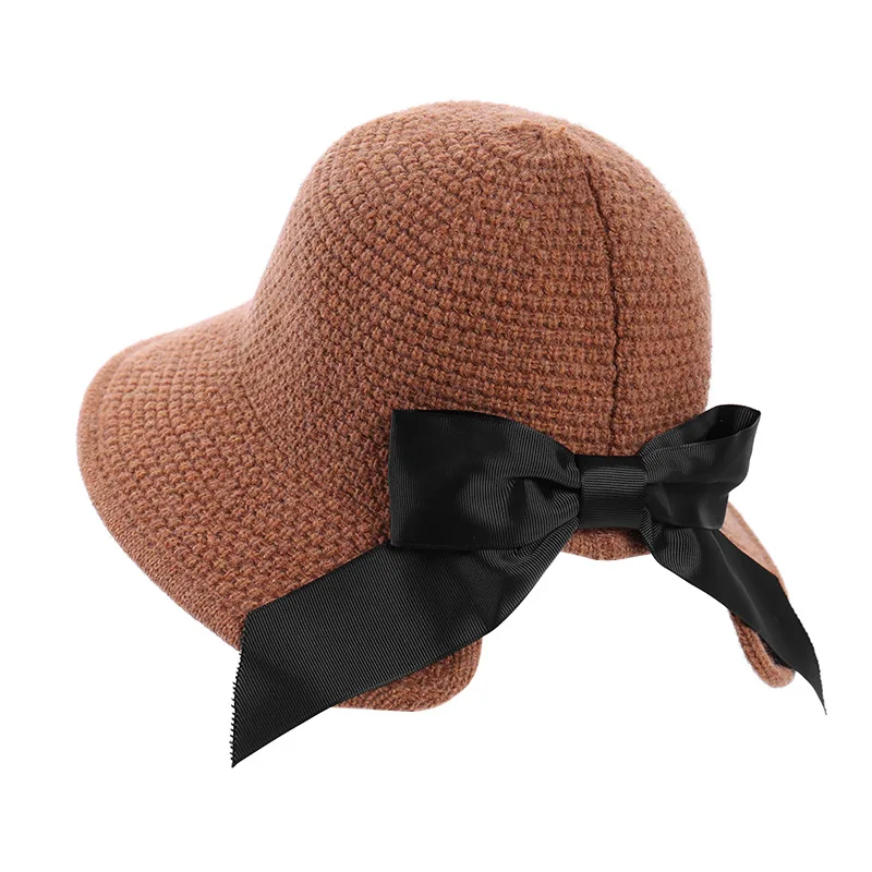 

the new pure color hat autumn winter warm wool knitting fisherman hat female han edition bowknot basin of windproof cap
