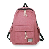 large capacity solid color blue pink black waterproof nylon casual unisex backpack students school bag womens mens package