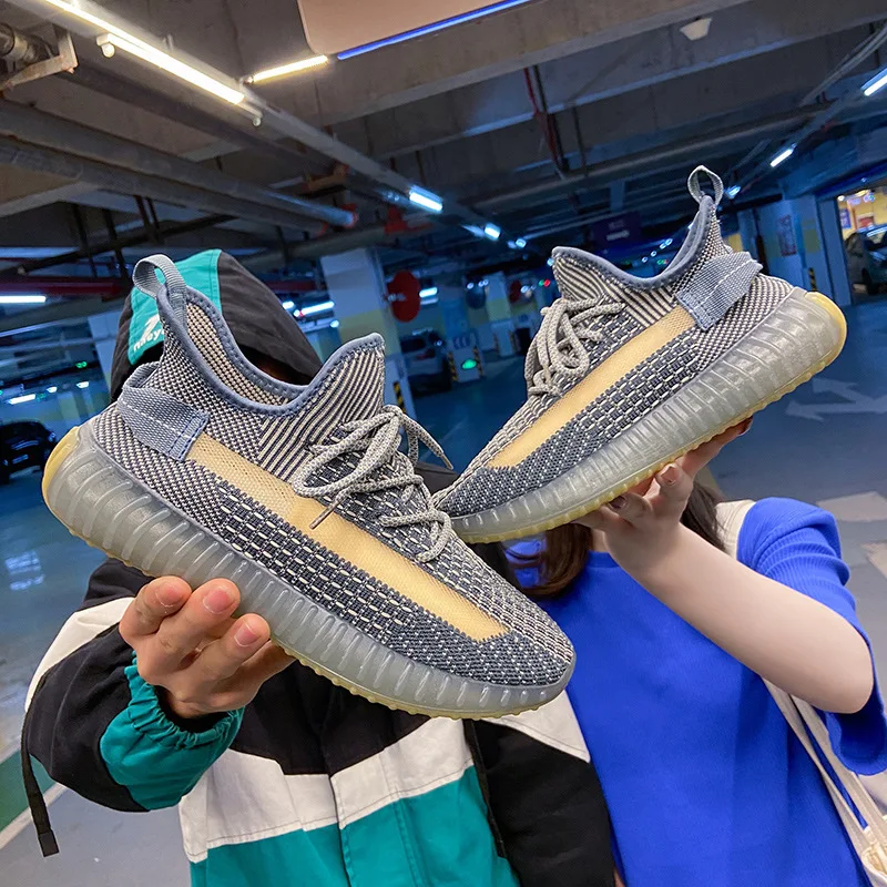 

2021 new spring flying woven mesh shoes coconut men's shoes summer breathable casual shoes sports shoes wild zengh old tide shoe