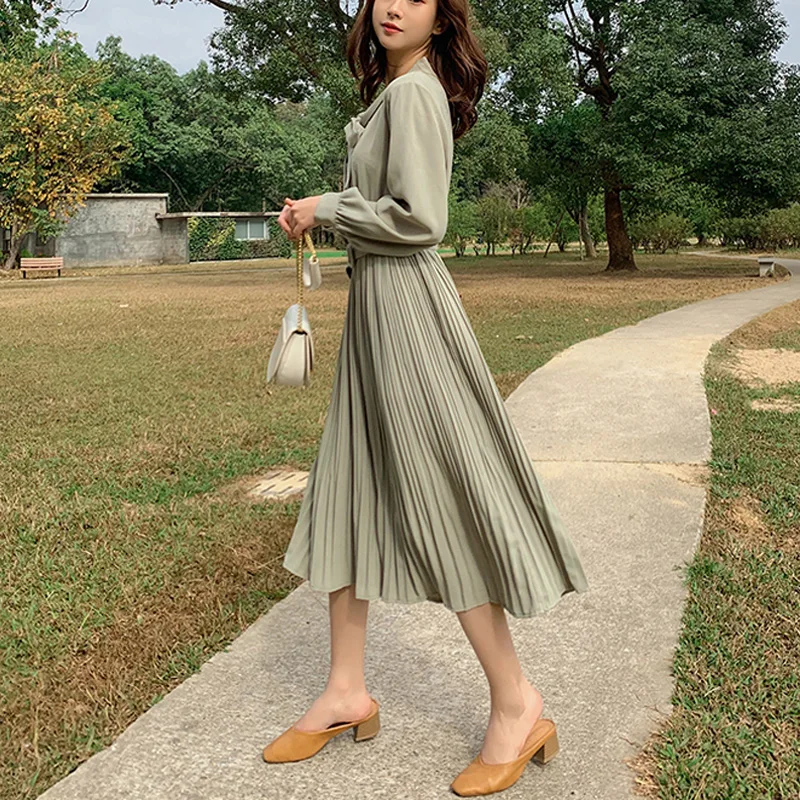 Женское винтажное однобортное платье-трапеция с бантом на шее поясом и высокой