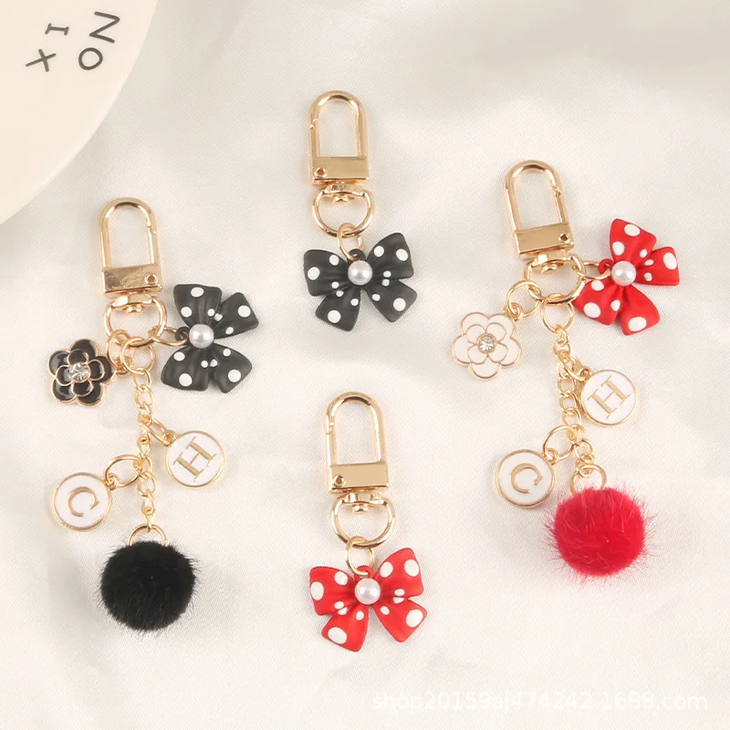 

3D Metal Personality Pearl Bow Keyring Fashion Car Keychain Children's Gift Cartoon Cute Key Chains Earphone Pendant