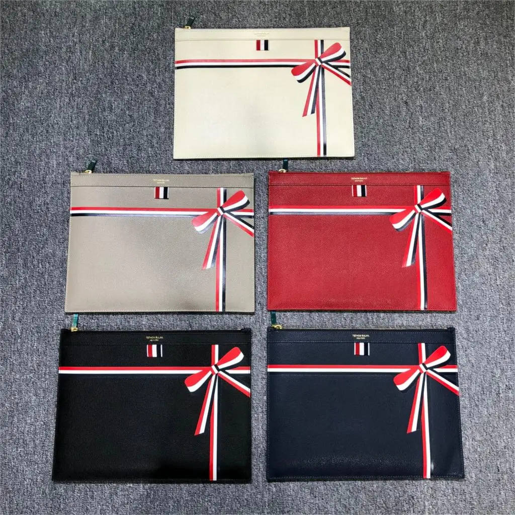 

TB THOM Fashion TB Brand Briefcase Genuine Leather Messenger Bags Cowhide Bow Pattern Casual Envelope Bag Men Women Hand Bags