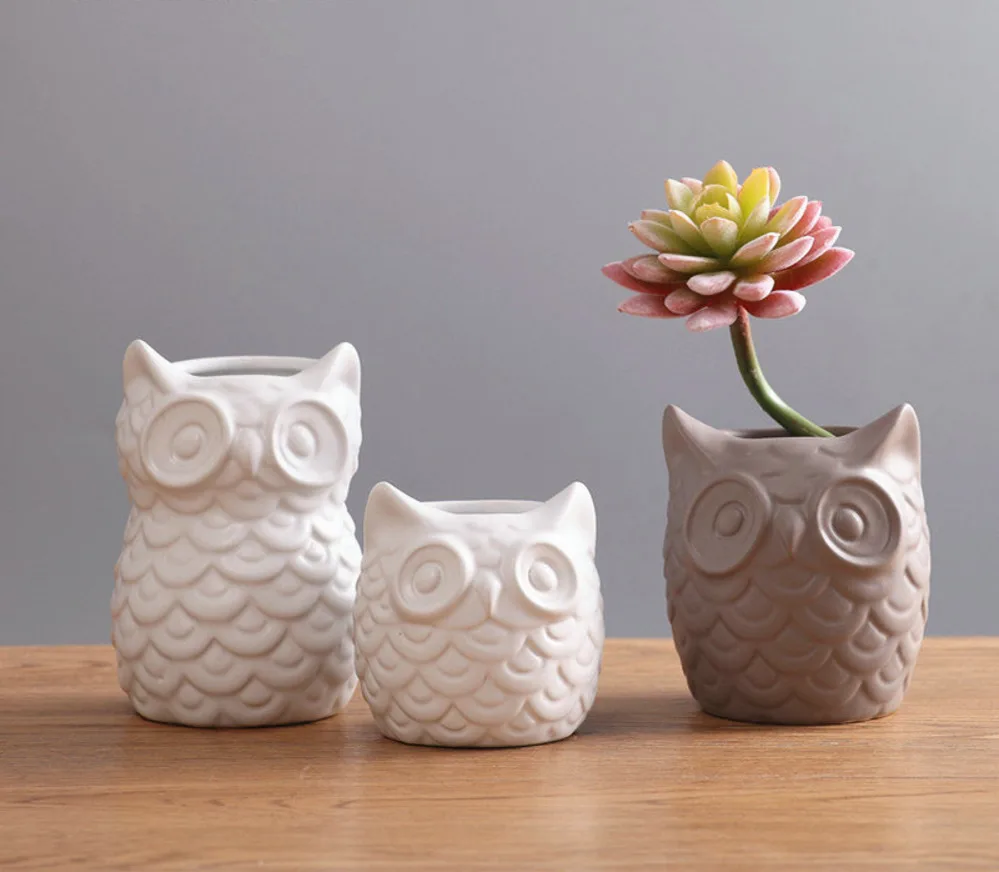 

Creative of Ceramic White Figure Guffo Artificial Northern Style Plant in Flower Vessel In Porcelain Animal Statute Complements