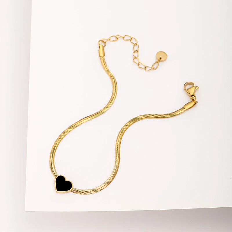 Женский браслет с подвеской в виде сердца золотистый цепочкой елочку трендовая