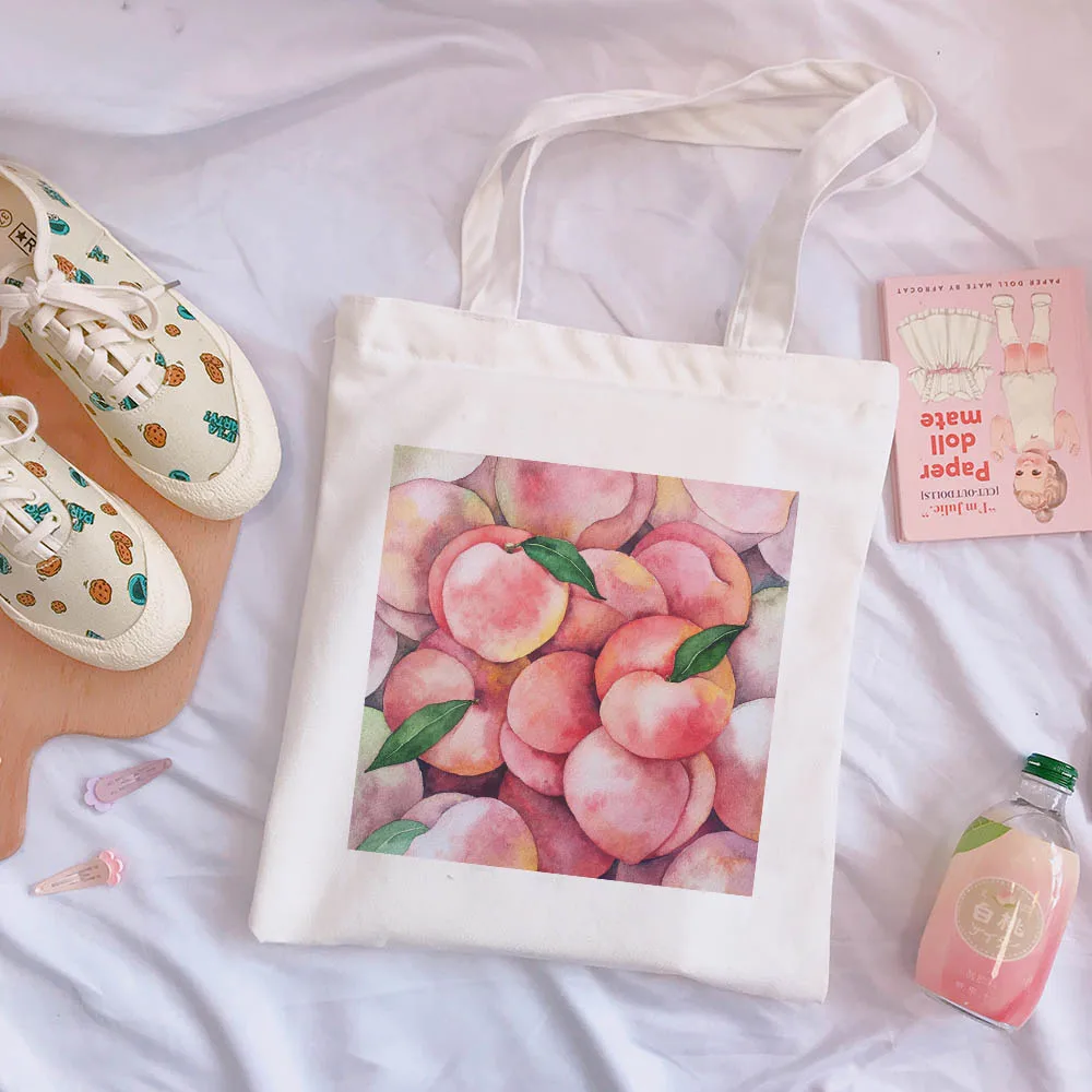 

Korean peach cute print new Harajuku bag large-capacity canvas vintage cartoon Ulzzang ins sweet college chic shoulder bags