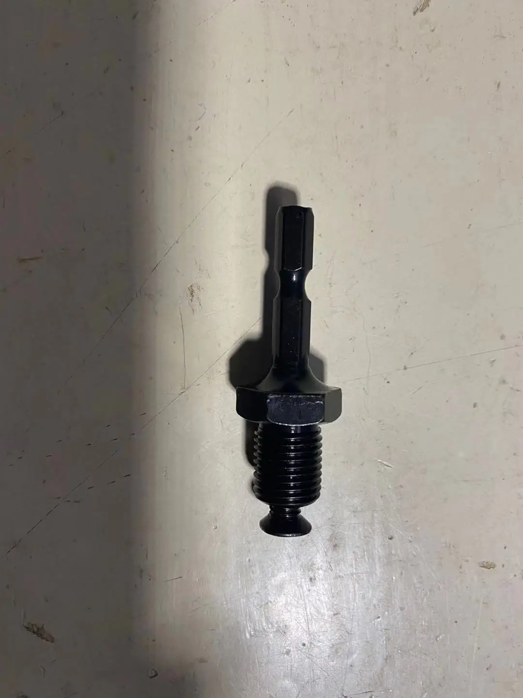 

Hexagonal 1/4" 6.35mm Hex Shank Adapter to 1/2-20UNF Hex Shank Male Thread w Reverse Screw for Drill Chuck