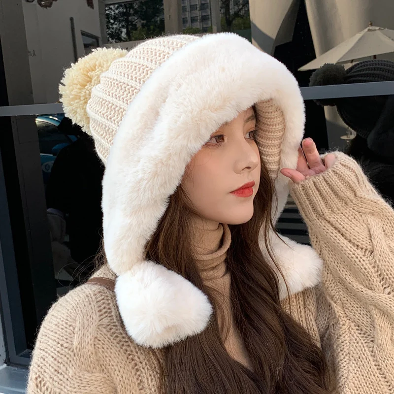 

2021 Korean winter new imitation rabbit hair Plush hat knitted wool hat lovely wool ball warm ear protection hat thick female