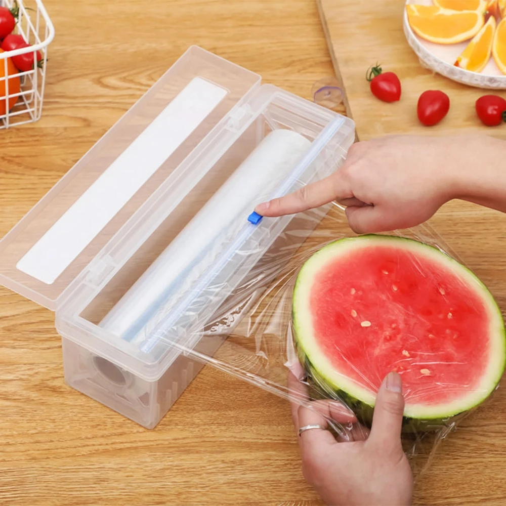 

Plastic Food Wrap Dispenser with Slide Cutter Adjustable Cling Film Cutter Preservation Foil Storage Box with Suction Bottom
