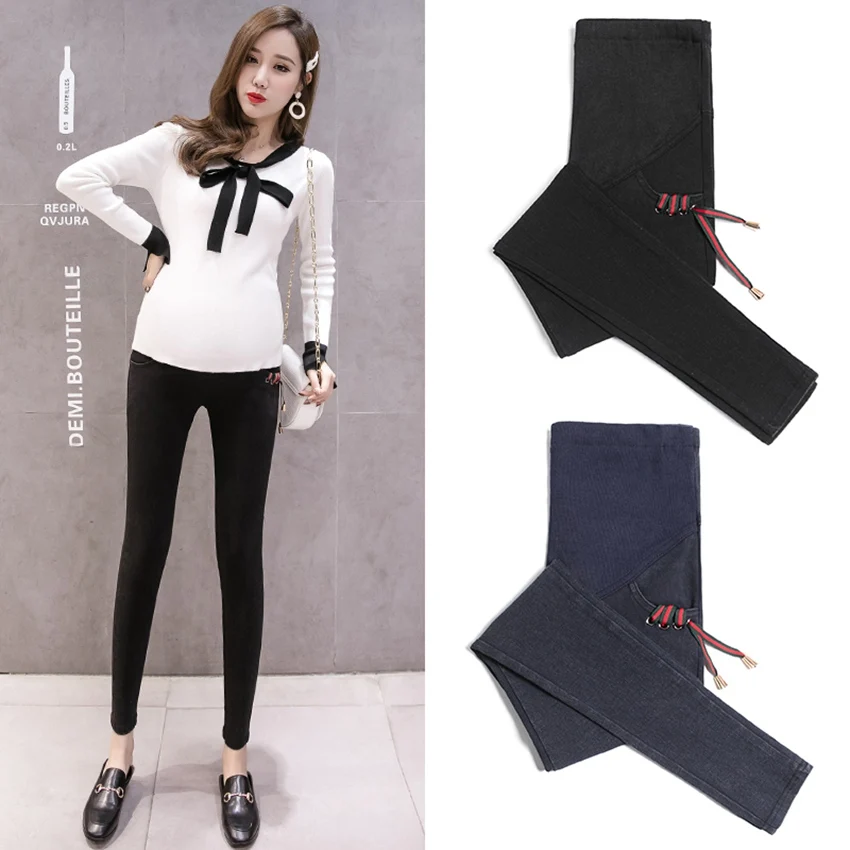 

Pregnant women's pants autumn wash water nine points jeans stretch thin bottoming stomach lift pencil feet pants