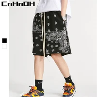 cnhnoh new arrival spring and summer tide brand personality cashew flower print loose casual drawstring terry shorts a503