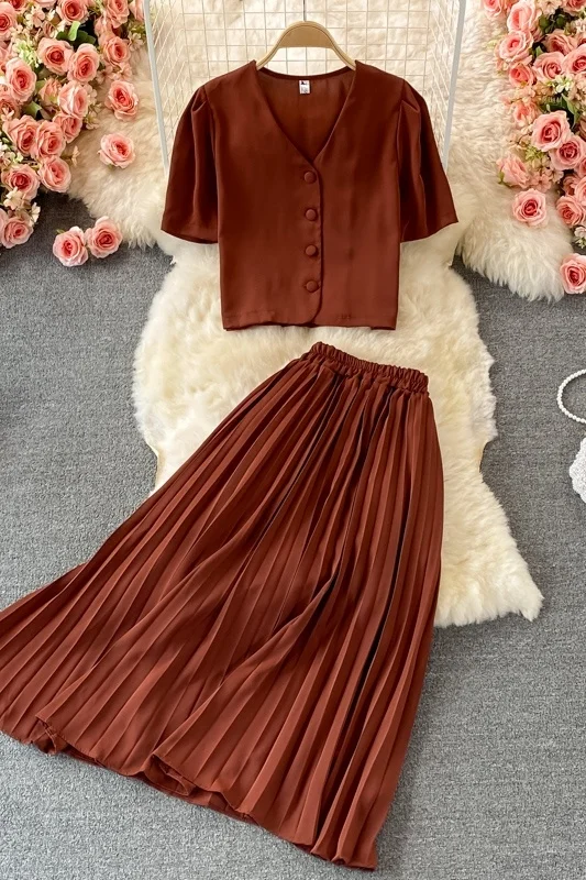 

High waistline mid length over knee pleated skirt two piece suit V-neck single breasted bubble sleeve top