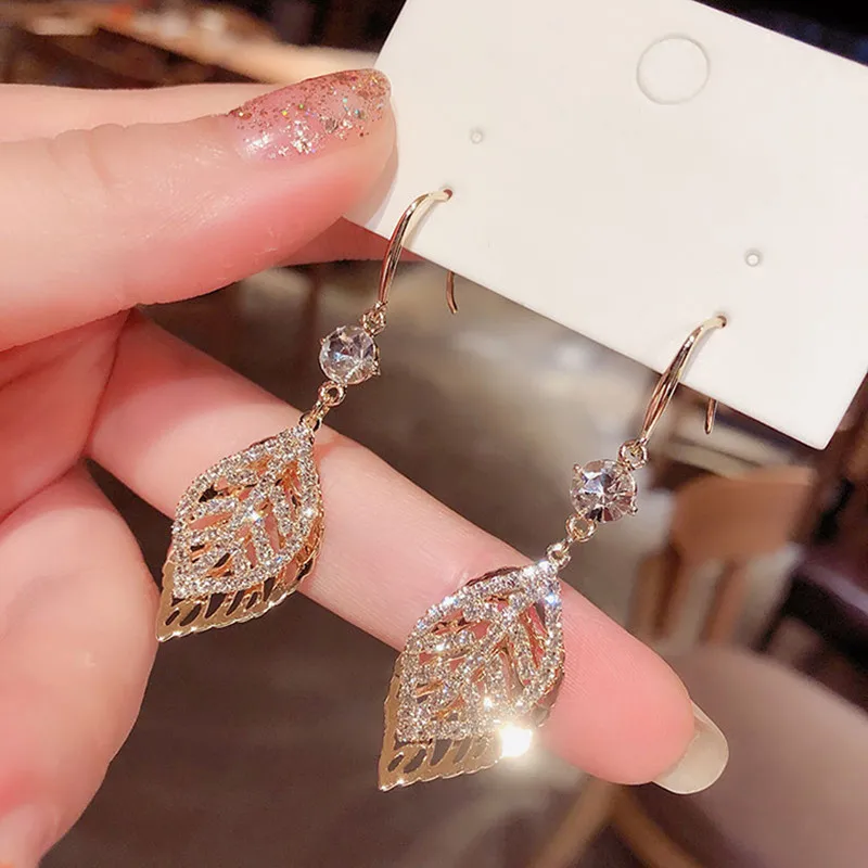 

Fashion Rhinestone Hollow Ear Hook Temperament Leaf Earrings