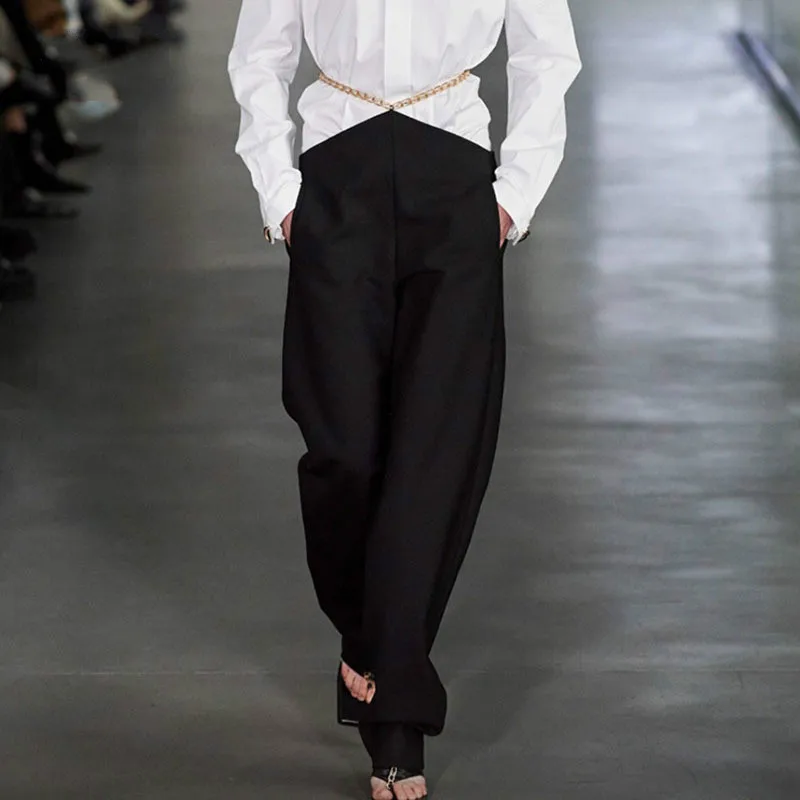 

Лоскутное цепи брюки для женщин с высокой талией выдалбливают сплошной минималистские чёрные брюки женский 2021 новые модные костюмы Стиль