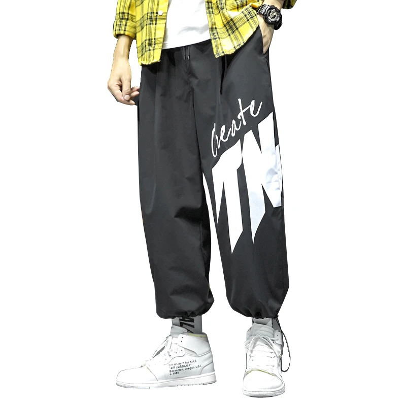 

Spring and autumn Sports Casual Harem Pants Men's Printed Letter Design Trousers Loose Fashion Street Pants Tide Male Oversize