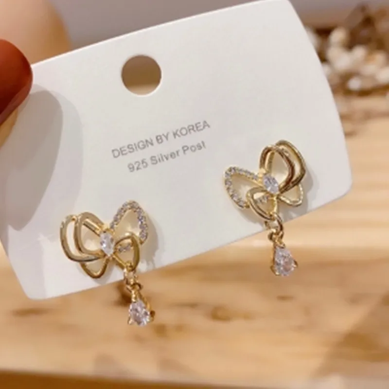 

S925 Silver Needle Korean Fashion Temperament Bowknot Crystal Personality Mini Female Stud Earrings Jewelry