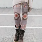 Женские эластичные леггинсы с геометрическим принтом