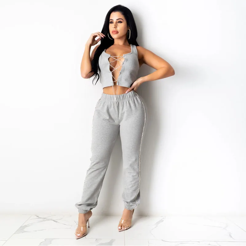 

Однотонный женский спортивный костюм, соблазнительный кружевной топ с вырезами и перекрестными шнуровками, брюки-карандаш, подходящий ком...