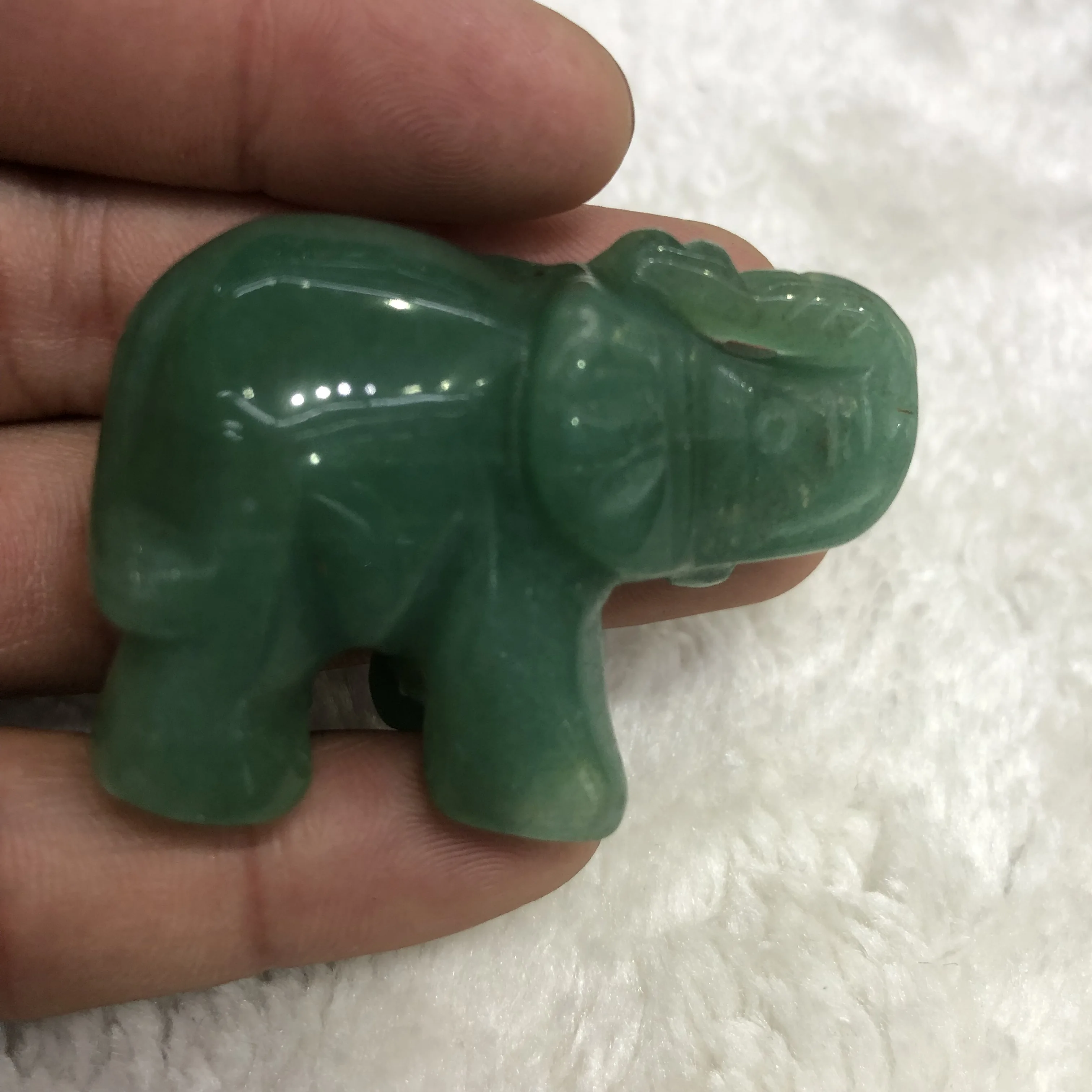 

Beautiful natural donglin jade hand-carved baby elephant as a gift and decorated home