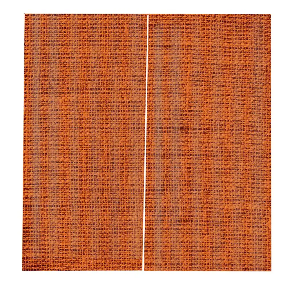 Оранжевая декоративная занавеска с грубой текстурой крупным планом плотная