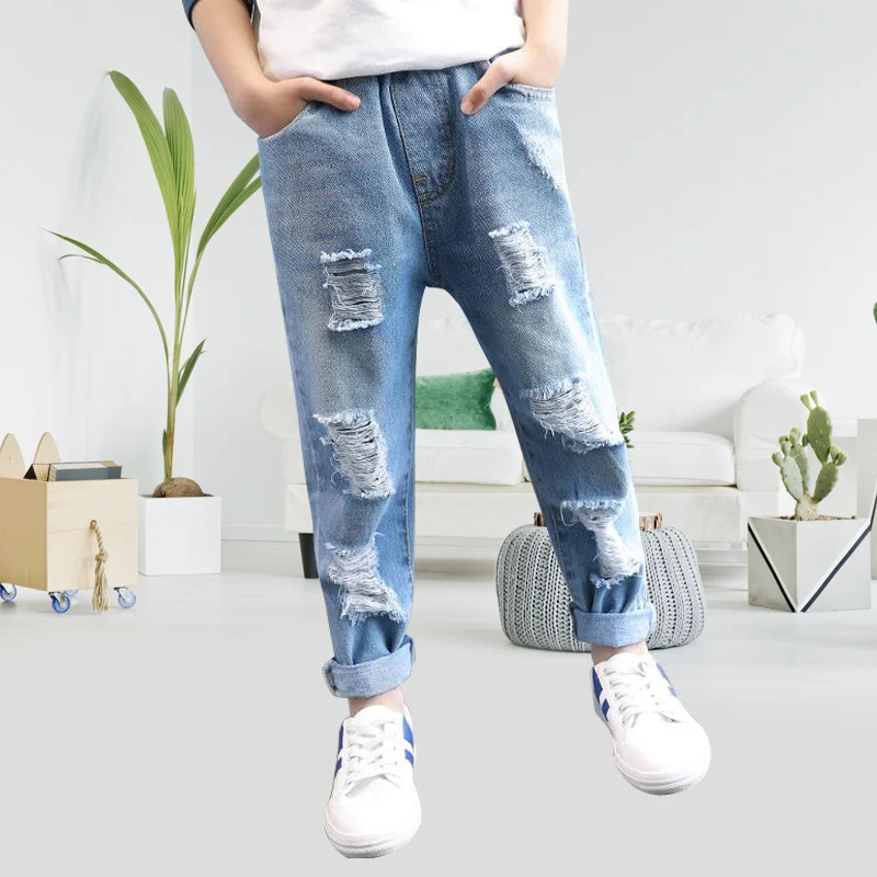

Children's clothing boy hole jeans spring 2018 new big boy spring and autumn Korean version of the tide boys pants
