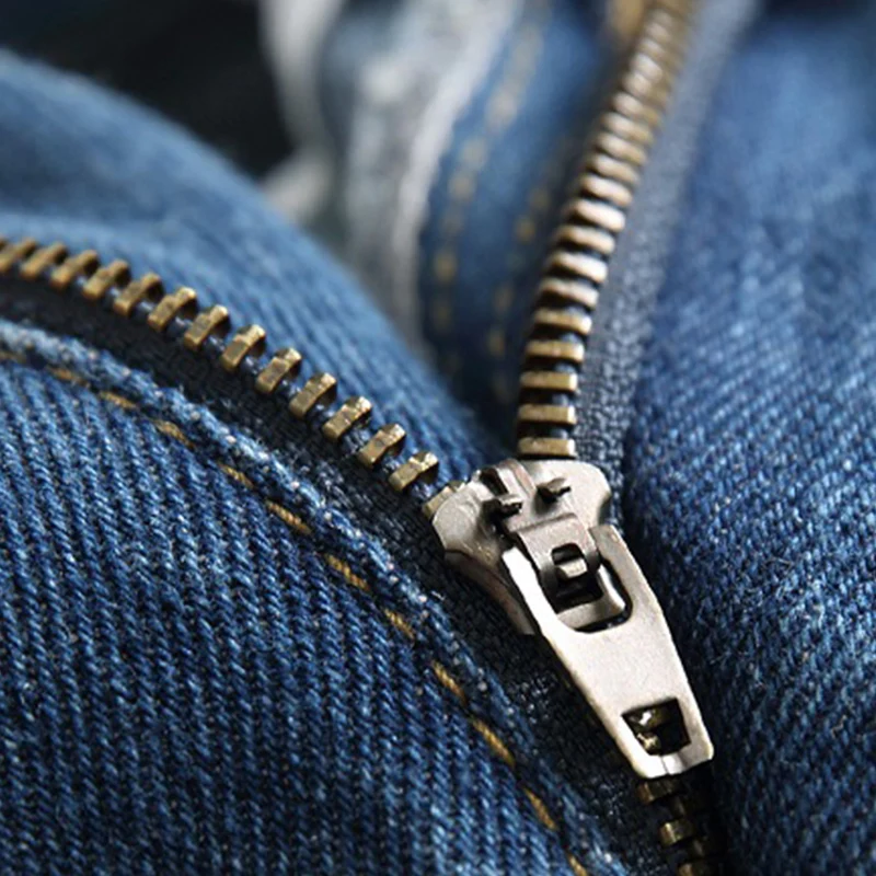 

2021 new spring and summer splash ink jeans blue ripped jeans button fashion trousers trendy men's trousers