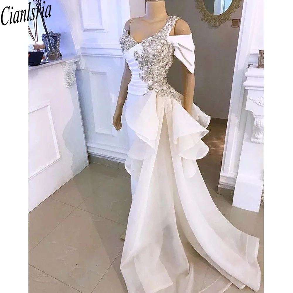 

White Prom Jumpsuit with Crystal Detailing and Detachable Side Peplum Tail 2020 Off shoulder Mermaid Evening Gown Pant Suit