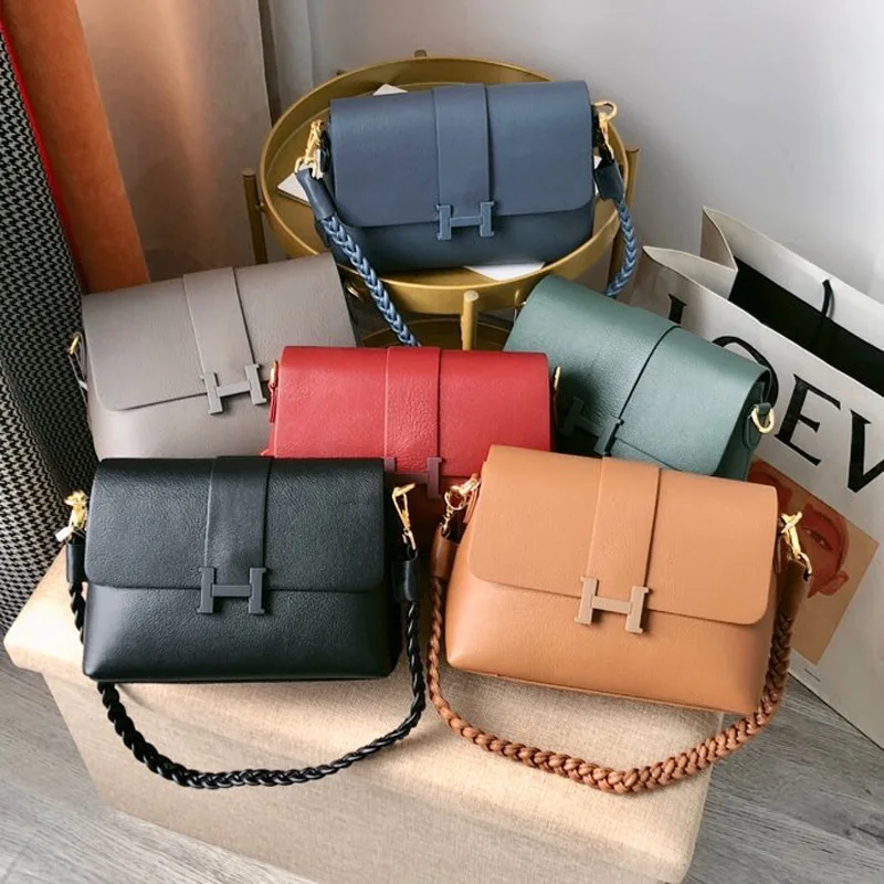 

2020 new leather saddle bag small twist braided small square bag cowhide underarm bag Korean retro head cowhide women's bag