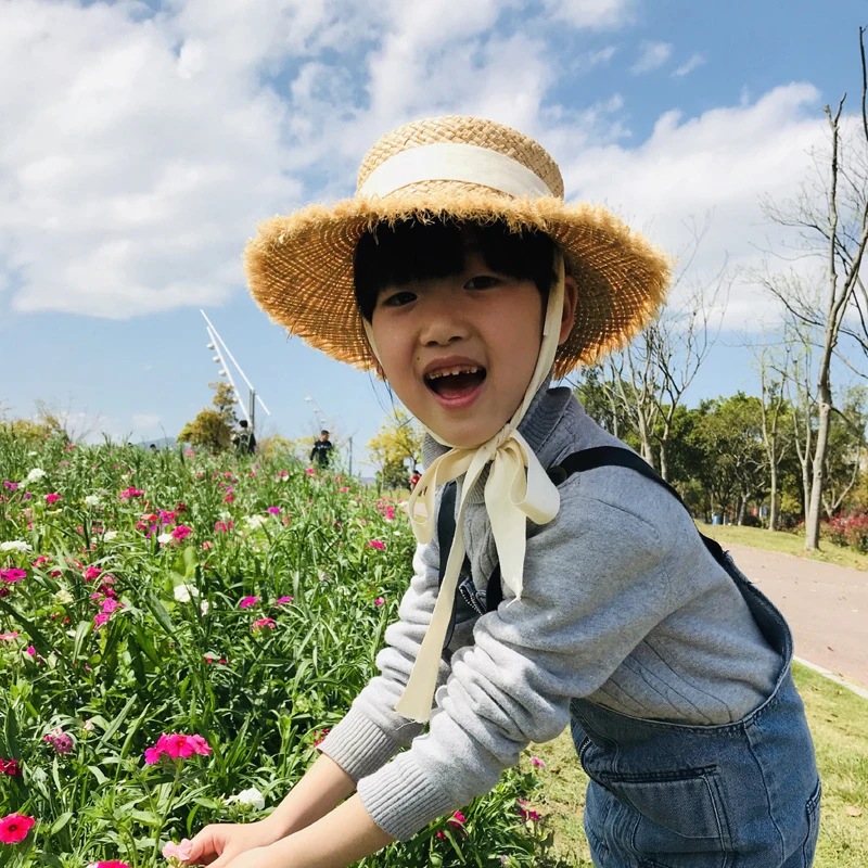

Fashion New Spring and Summer Children's Raffia Straw Hat Sun Hat Outing Sunscreen Straw Hat All-match Boy and Girl Bandage Hat