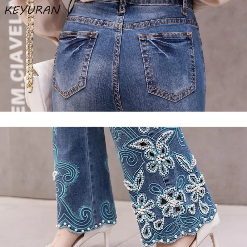 Выдалбливают Бисер цветочной вышивкой синие джинсы с высокой талией