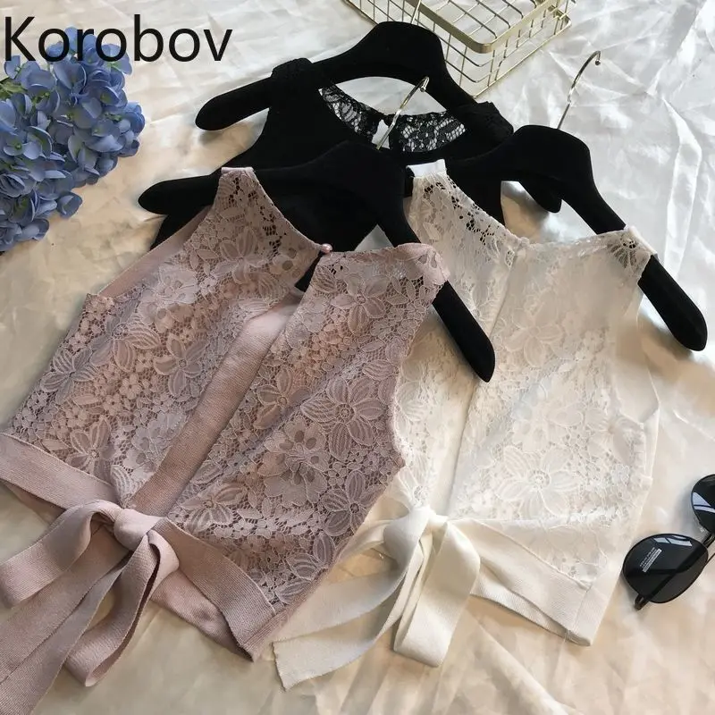 Korobov/Летний короткий женский жилет с разрезом сзади и бантом кружевной вязаный