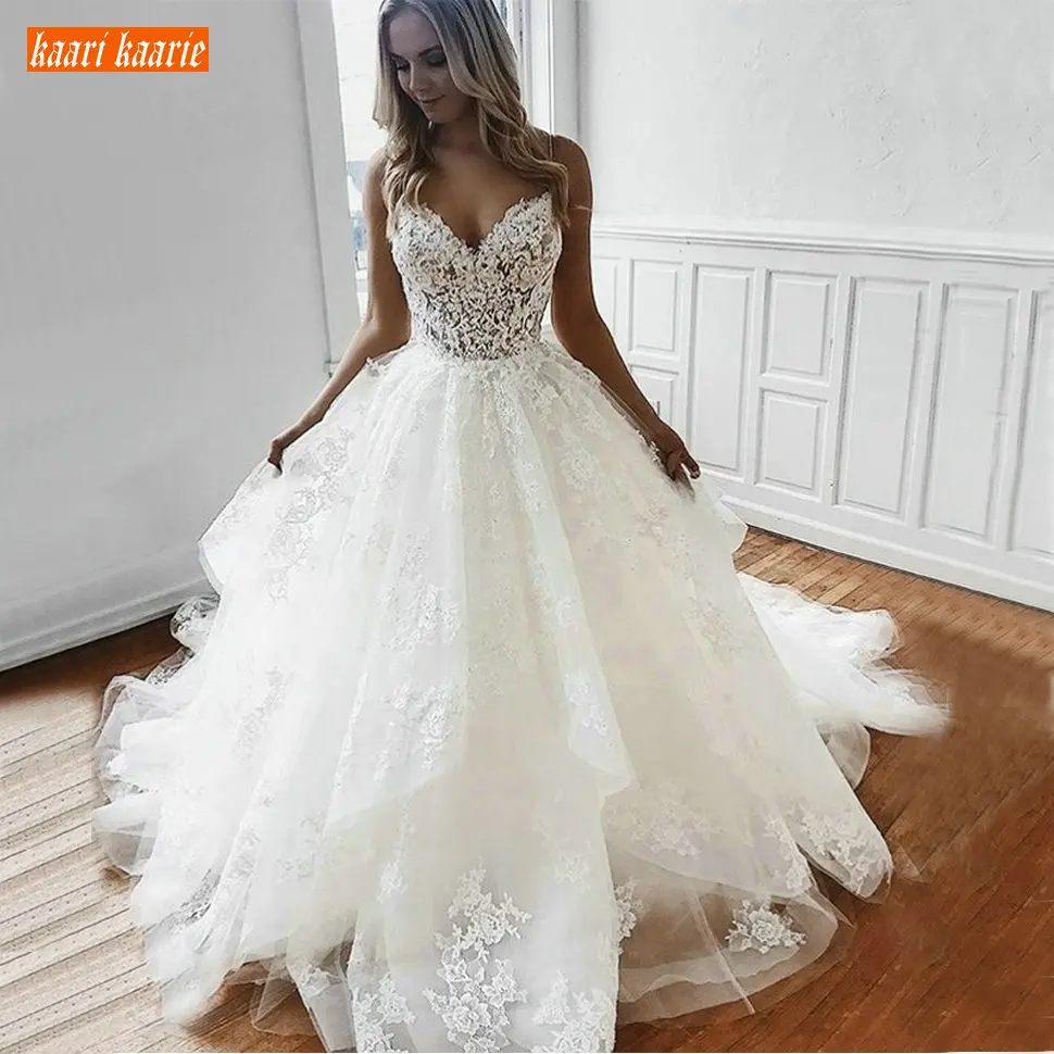 

Aristocratic Ball Gown Wedding Dresses Spaghetti Straps Backless Bridal Gowns Long Tulle Lace Applique Court Train Wedding Dress