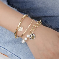 korean version of ins fashion love freshwater pearl alloy smiling face minority design set bracelet female
