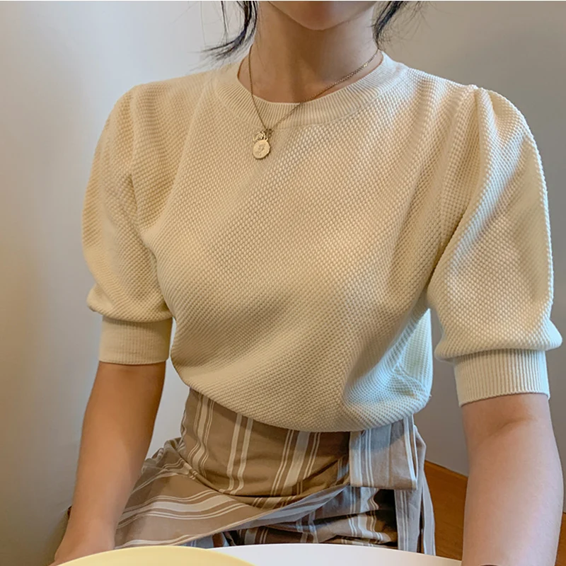 

Simple round neck pullover loose solid color wild five-point puff sleeve sweater